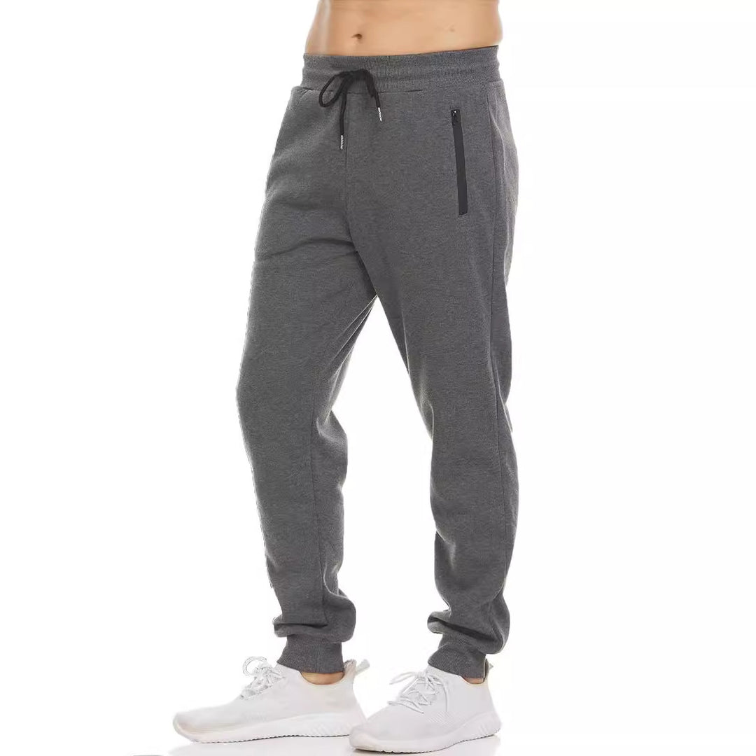 Women's nan tapered jogging pants with elastic comfort waistband, water-repellent zip pocket and ribbed ankle cuffs Mune Fashion