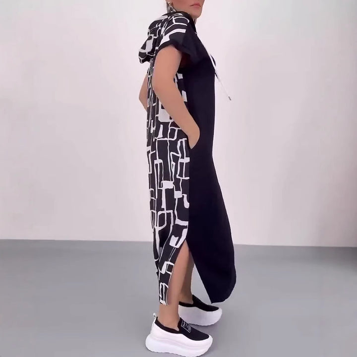 Women's casual hooded kaftan dress in loose fit with short sleeve cut and abstract graphic pattern Mune Fashion