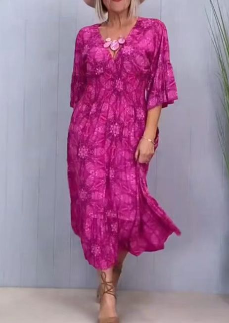 Women's flowing kaftan midi dress with V-neck, loose silhouette, tiered skirt, and three-quarter sleeves Mune Fashion