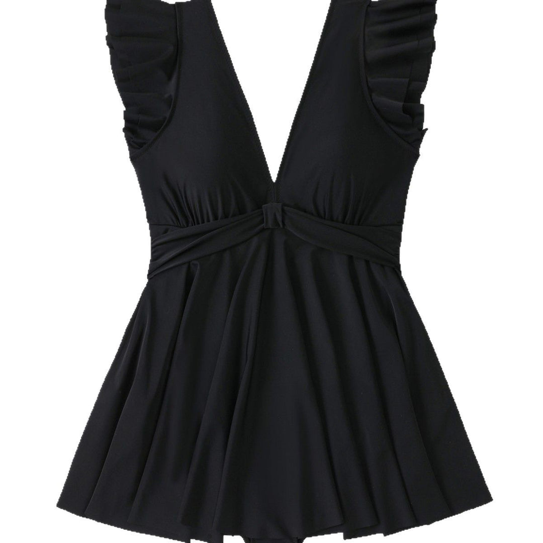Women's beach dress with a light V-neck and voluminous ruffle details Mune Fashion