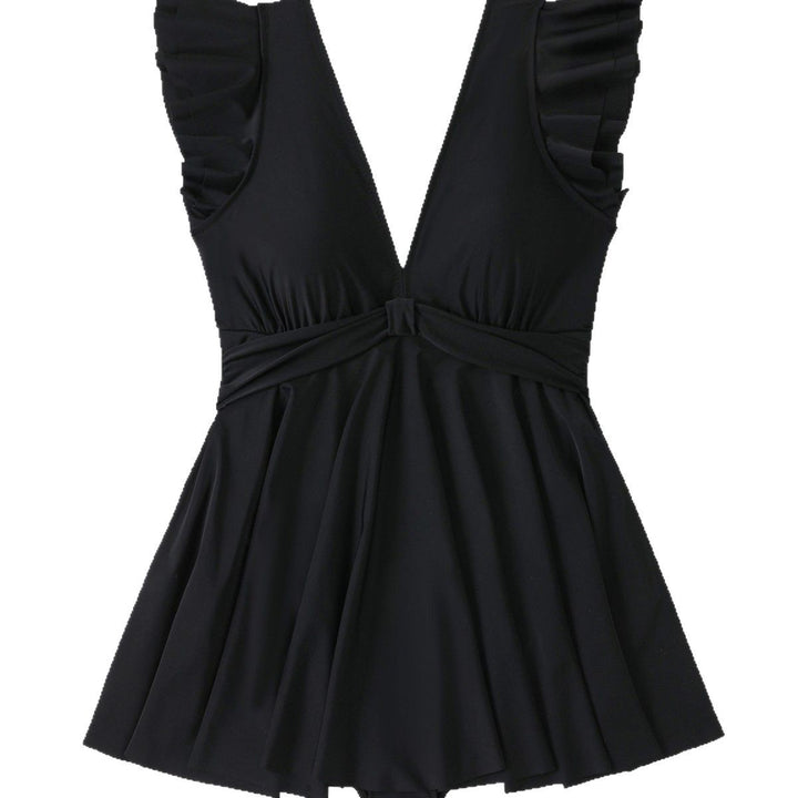Women's beach dress with a light V-neck and voluminous ruffle details Mune Fashion