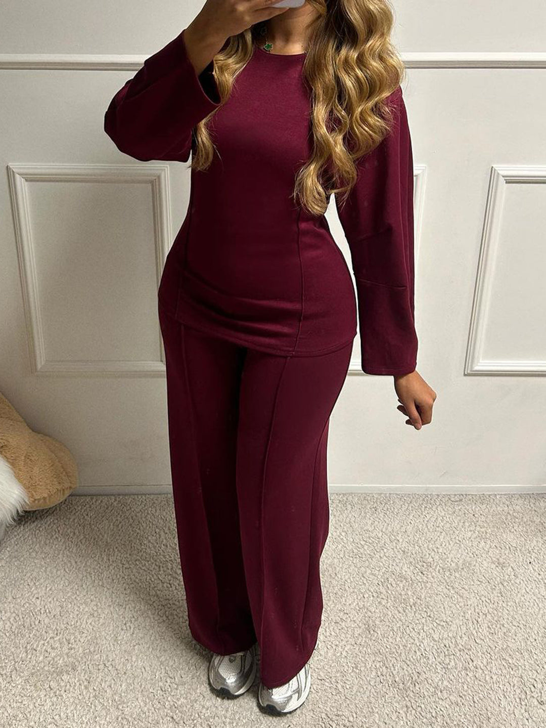 Women's soft lounge set with fitted sweatshirt, sculpting seam details, and wide palazzo pants leg Mune Fashion