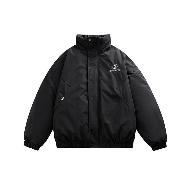 Unisex Boxy padded short jacket with stand-up collar and concealed button placket Mune Fashion