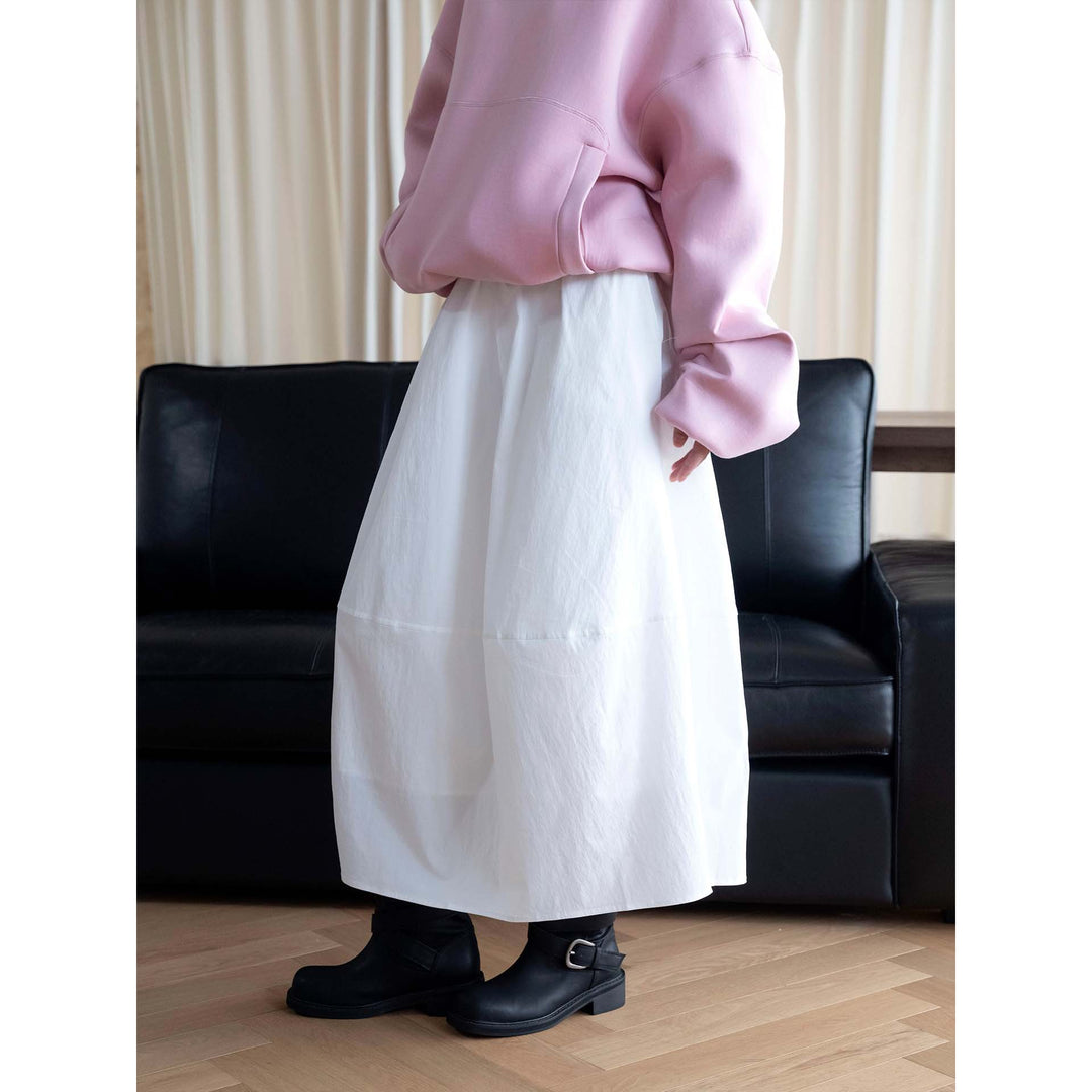 Women's midi skirt with high elastic waistband, flowing wide design and practical side pockets Mune Fashion