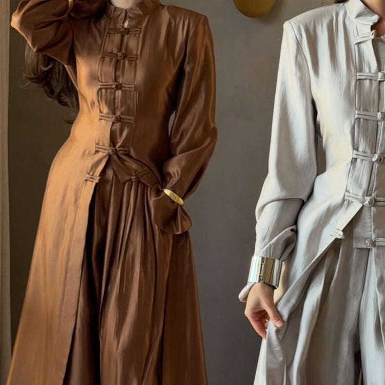 Women’s maxi dress with stand-up collar, traditional knot closure, and balloon sleeves Mune Fashion