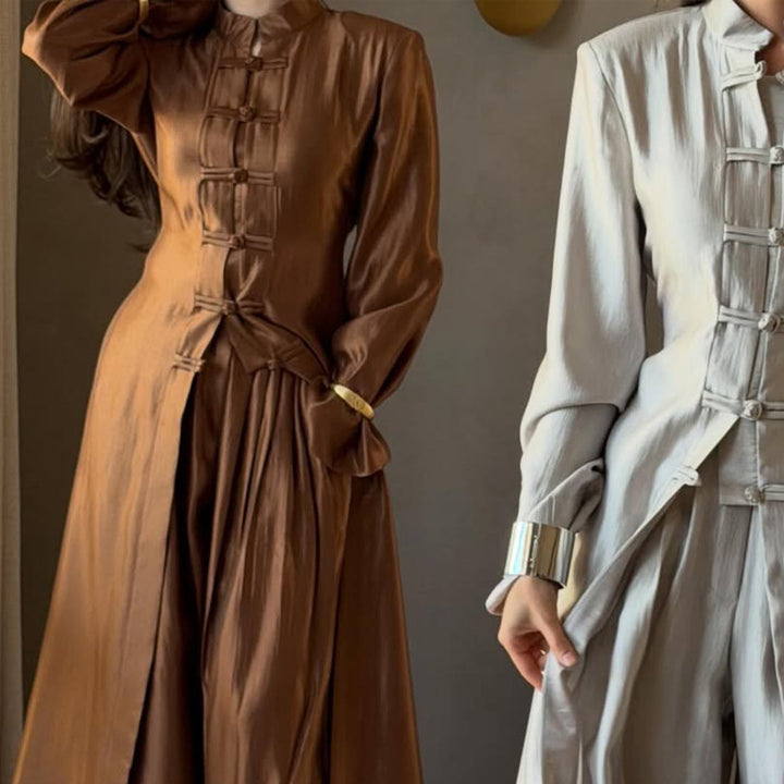 Women’s maxi dress with stand-up collar, traditional knot closure, and balloon sleeves Mune Fashion