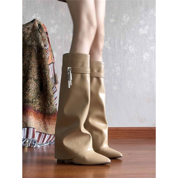 Women's knee-high leather boots with pointed toe shape, flat heel and side buckle closure Mune Fashion