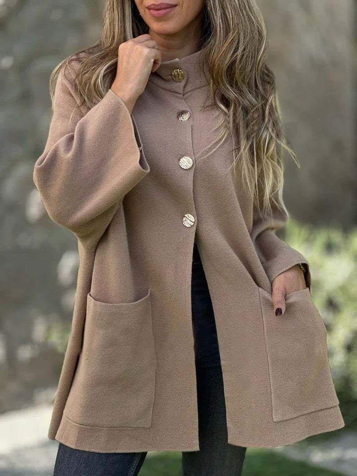Women's Oversize Cape Cardigan with Stand-Up Collar, Patch Pockets, and Decorative Buttons Mune Fashion