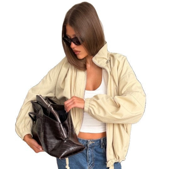Women's Oversize Windbreaker with high stand-up collar, drawstring shoulder yoke, and balloon sleeves Mune Fashion