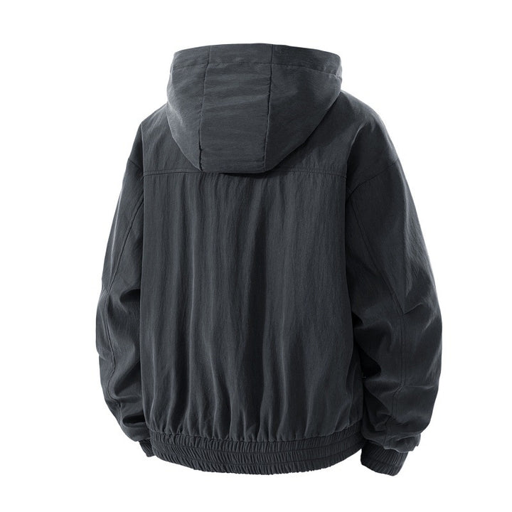 Men's lightweight utility hooded jacket with stowable hood, water-repellent coating, zippered pockets, and elastic cuffs Mune Fashion