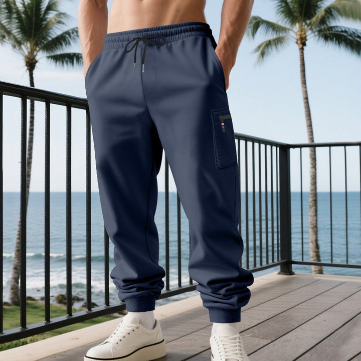 Men's casual joggers with cargo zip pocket, elastic waistband, and ribbed cuffs Mune Fashion