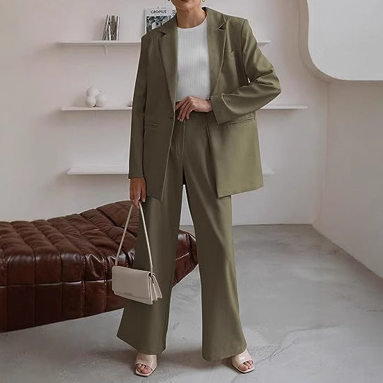 Women Long Blazer Set with boxy oversized silhouette, structured shoulder area and high-waisted palazzo pants Mune Fashion
