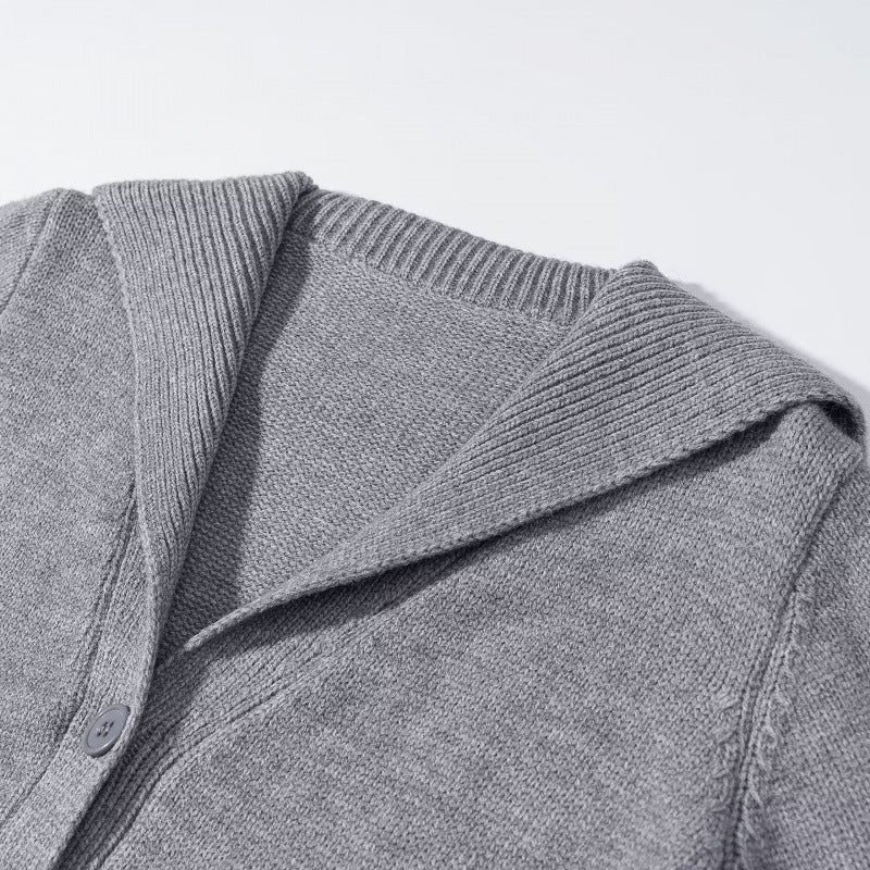 Women's knitted cardigan with large shawl collar, button placket, and patch pockets Mune Fashion