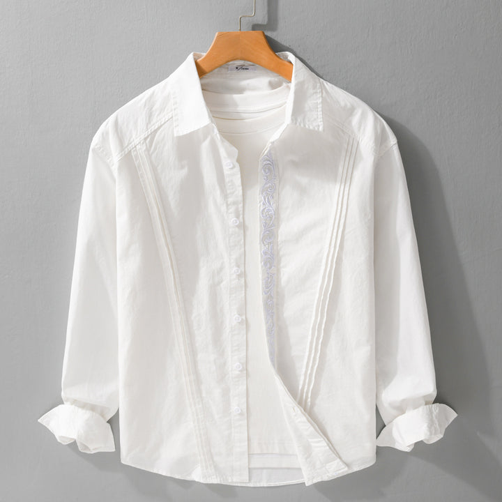 Women's cotton blouse with pleats, embroidery detail and relaxed-fit drape