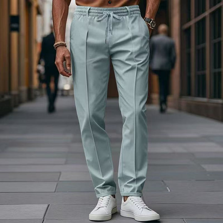 Men's elegant straight-cut chino jogging pants with crease, elastic waistband and drawstring Mune Fashion