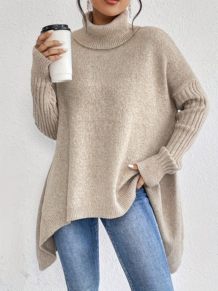 Women's oversized knit sweater with high turtleneck, ribbed sleeves, and asymmetric hem Mune Fashion