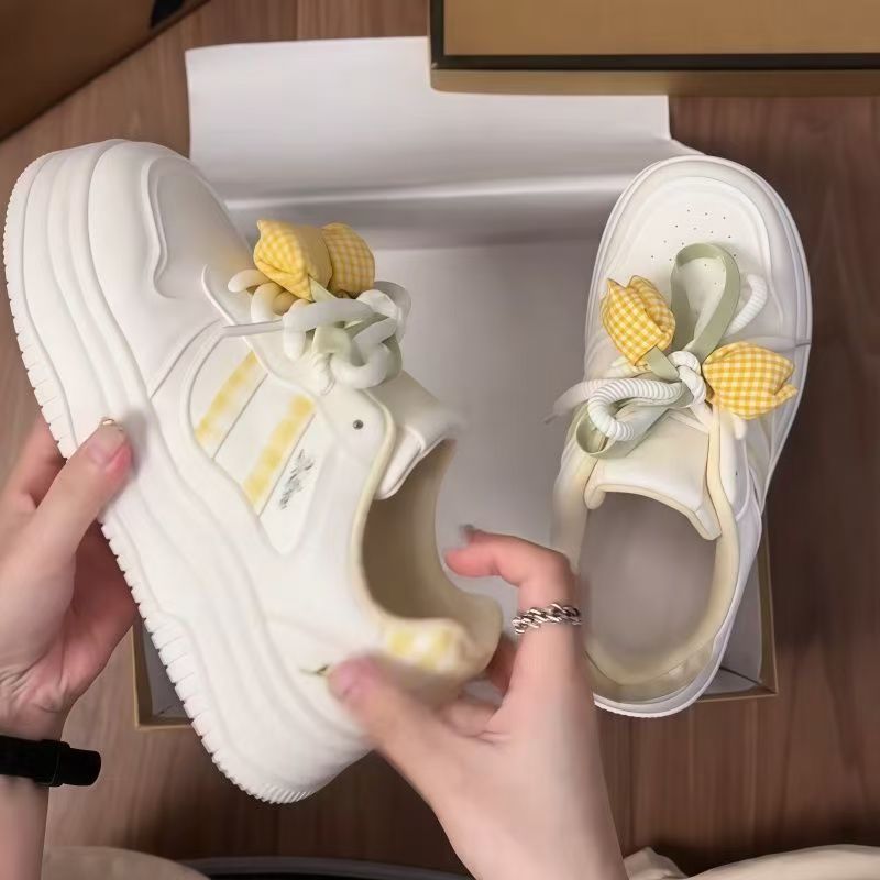 Women Sneakers with playful design and decorative bows from Mune Fashion