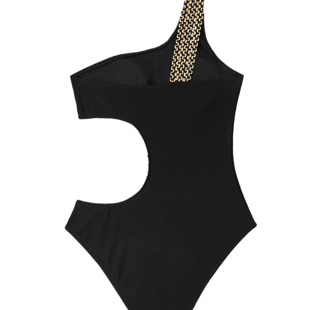Women's bathing romper with asymmetrical cut and decorative straps Mune Fashion