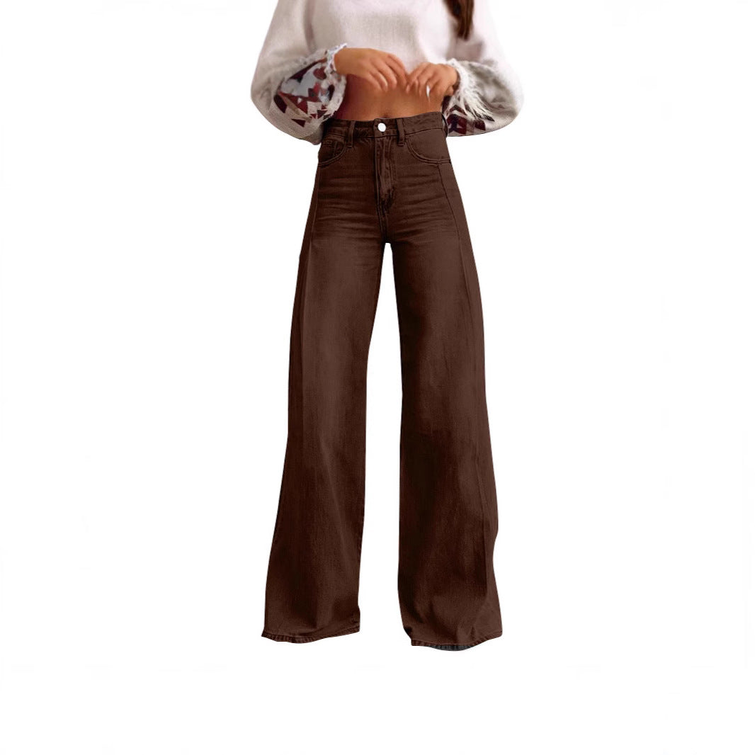 Women high-waisted flared jeans with extra wide leg, figure-flattering fit and subtle vintage wash Mune Fashion
