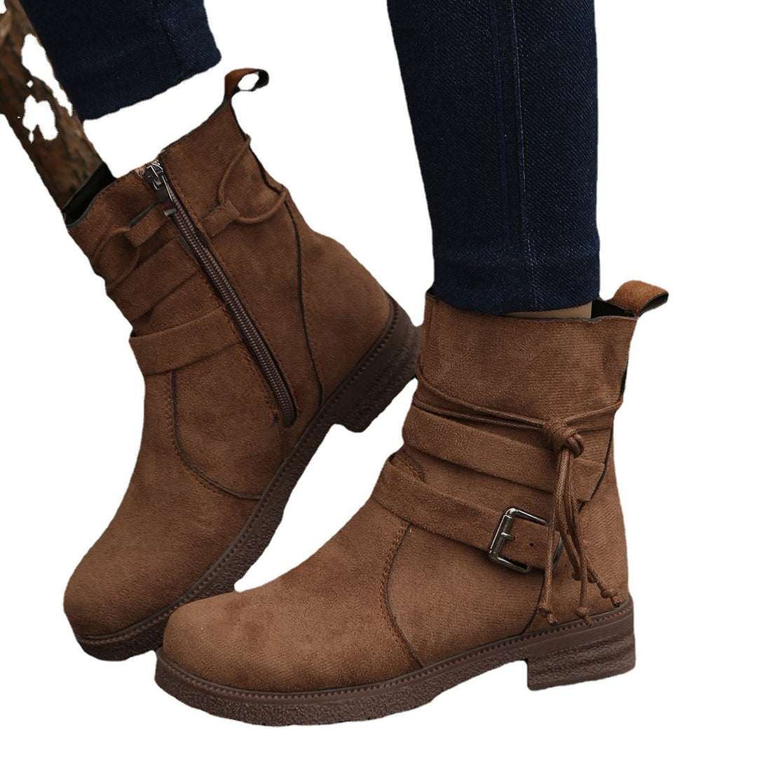 Women's ankle boots made of suede effect with a side zipper, decorative wrap strap, and sturdy profiled sole Mune Fashion
