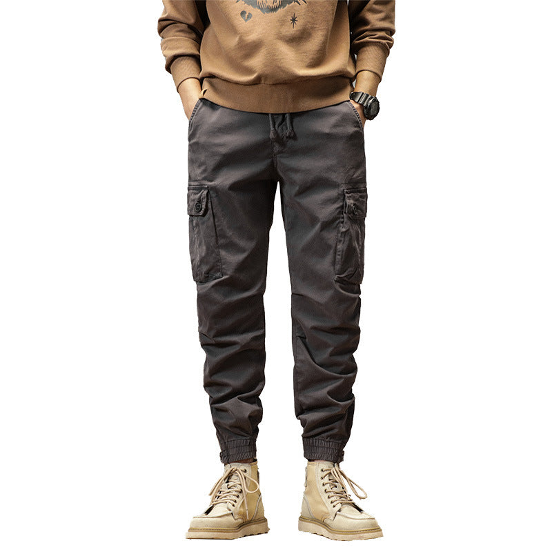 Men's robustly cut canvas cargo jogging pants with drawstring waist, knee patches, and elastic ankle cuffs Mune Fashion