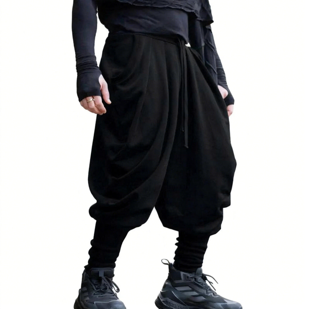 Men's avant-garde harem pants with wrap front, elastic waistband, and slim ankles Mune Fashion