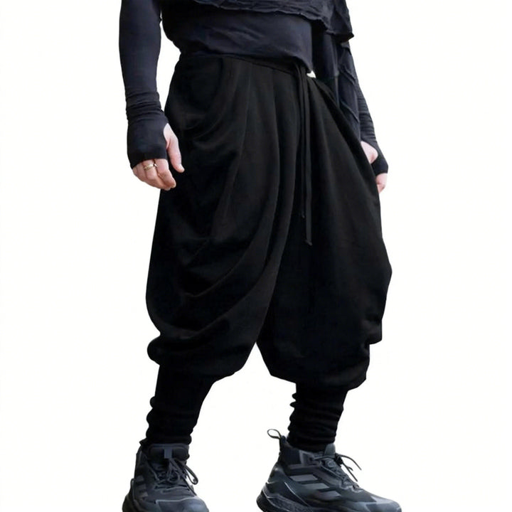 Men's avant-garde harem pants with wrap front, elastic waistband, and slim ankles Mune Fashion