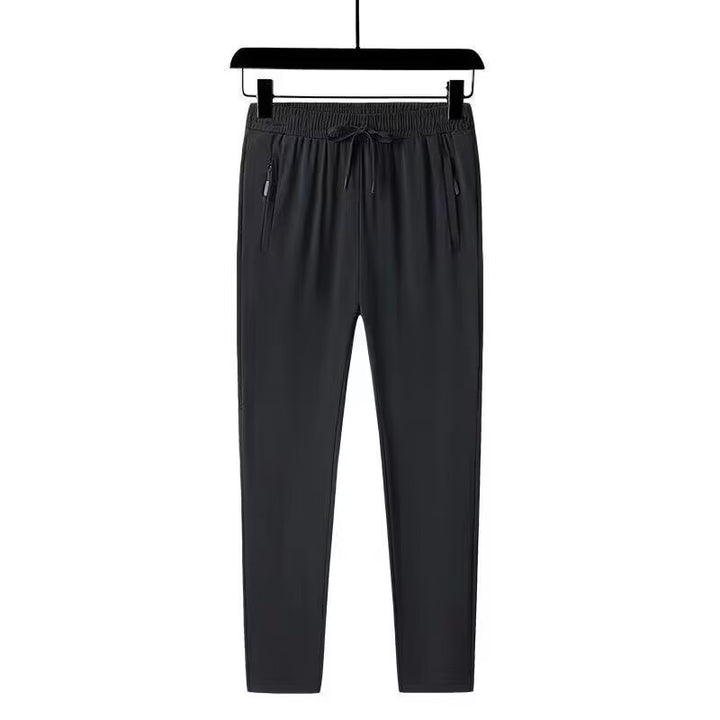 Men's sporty jogging pants with zipper and elastic waistband Mune Fashion
