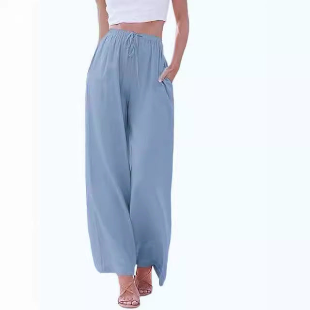 Women's wide linen pants with elastic waistband, drawstring, and side pockets Mune Fashion