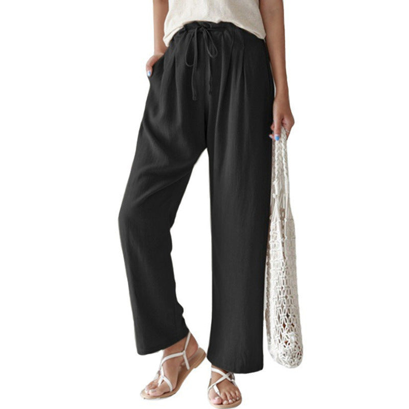 Ladies casual linen pants with wide legs, elastic waistband and side pockets Mune Fashion