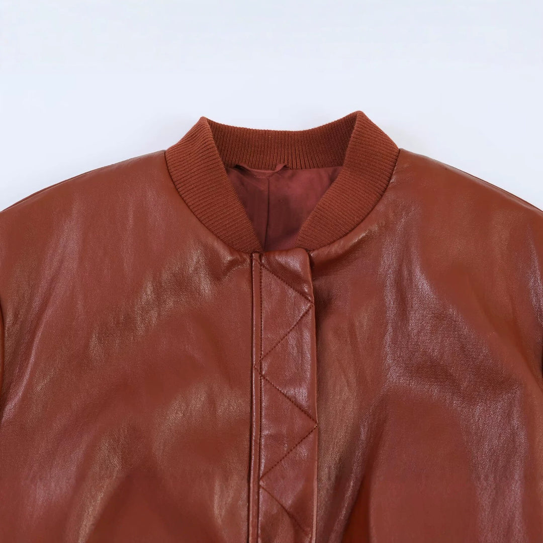 Women's Shiny Faux Leather Bomber Jacket with Ribbed Collar, Concealed Snap Button Placket and Kangaroo Pockets Mune Fashion
