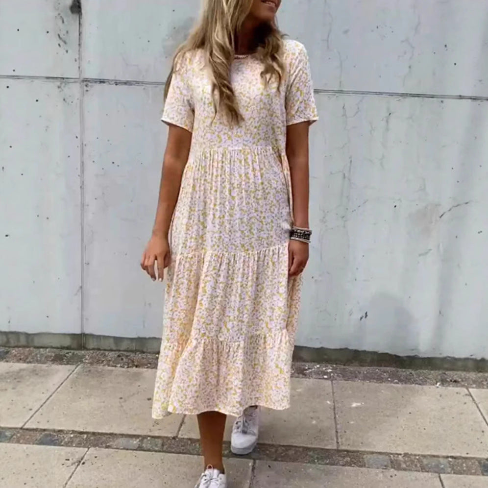Women's flowing tiered maxi dress in Boho babydoll style with gathered underbust and short sleeves Mune Fashion