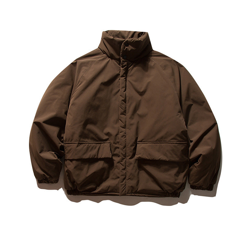 Unisex Boxy Padded Transition Jacket with High Stand-Up Collar, Elastic Cuffs and Flap Pockets Mune Fashion
