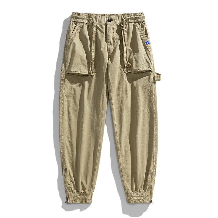 Men's workwear cargo pants in tech jogger style with applied front pockets, hammer loop, and ankle zippers Drune