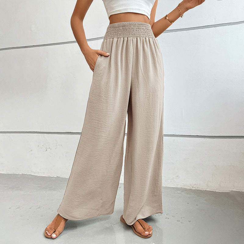 Women's palazzo pants with a high, elastic ruffled waistband and side pockets Mune Fashion