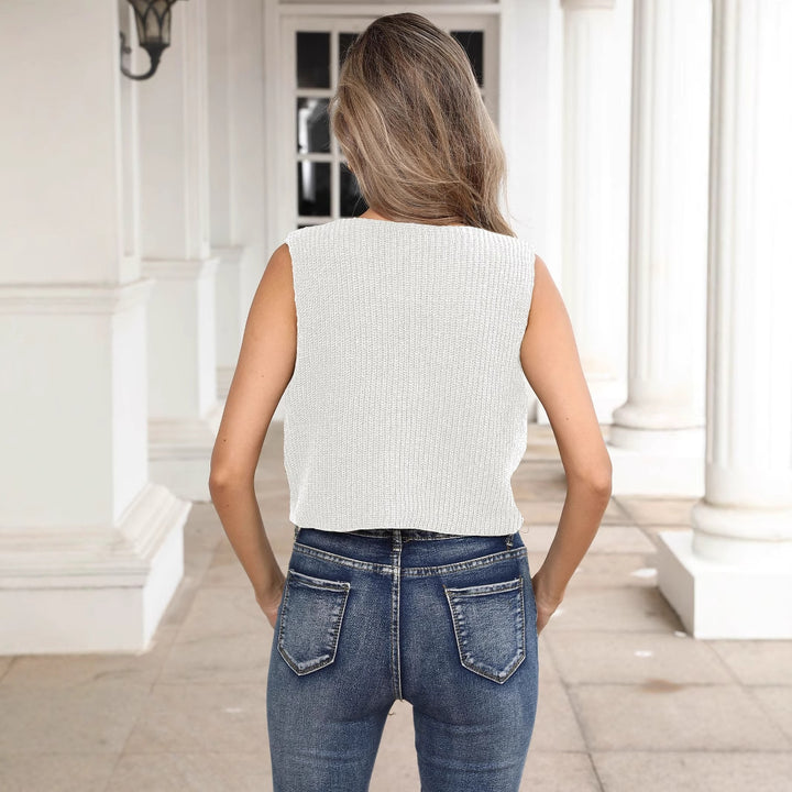 Ladies short knit top with floral appliqués Mune Fashion
