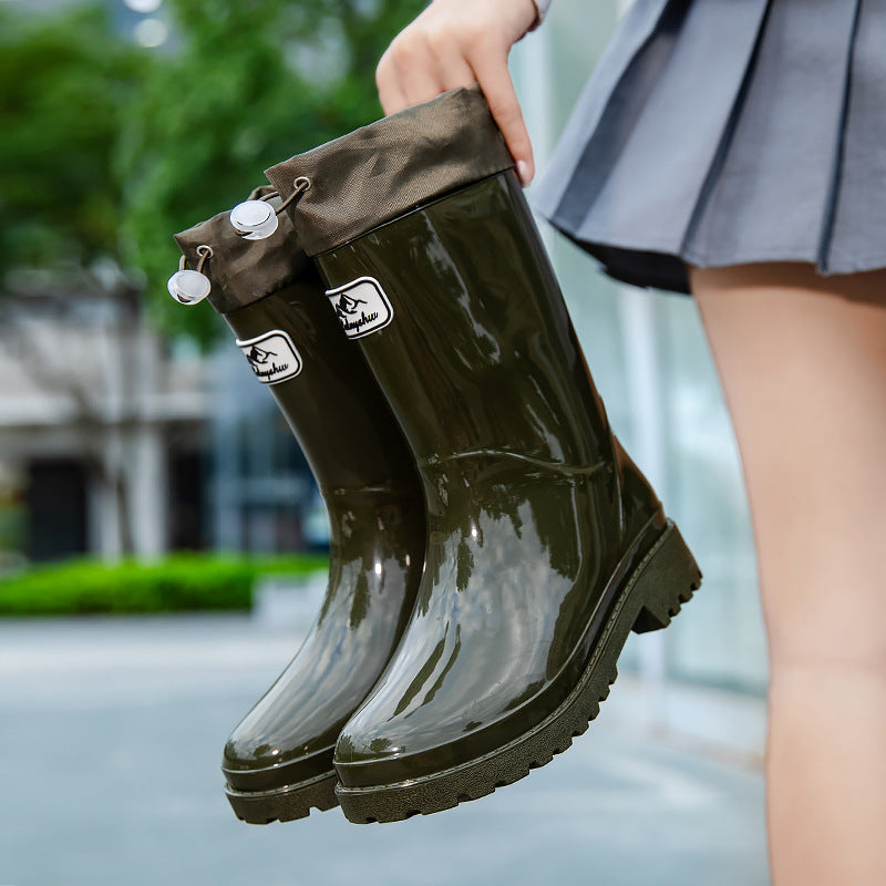 Women's Shiny ankle-high rain boots with drawstring and non-slip profile sole Mune Fashion