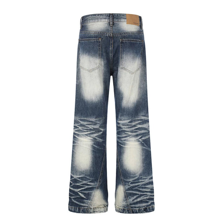 Women High-Waisted Wide Flare Jeans with Used Wash and Studded Trim Mune Fashion
