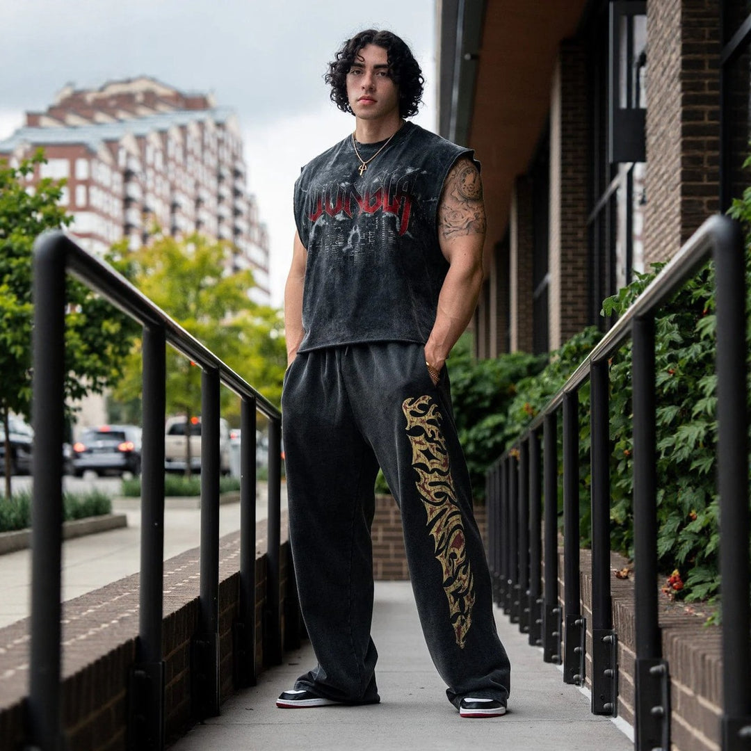 Men's baggy joggers with elastic waistband, side pockets and detailed skull and rose motif Mune Fashion
