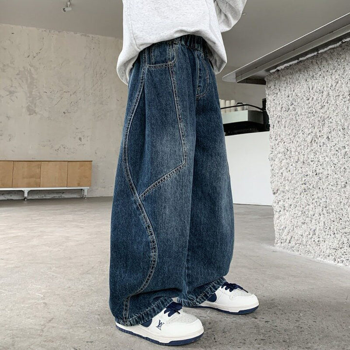 Women's wide denim pants with elastic waistband and stylish contrasting seams Mune Fashion