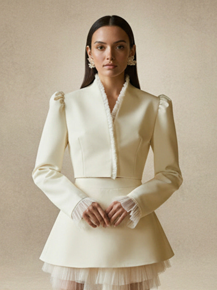 Ladies short blazer with tailored cropped silhouette, gathered shoulders and delicate tulle cuffs Mune Fashion
