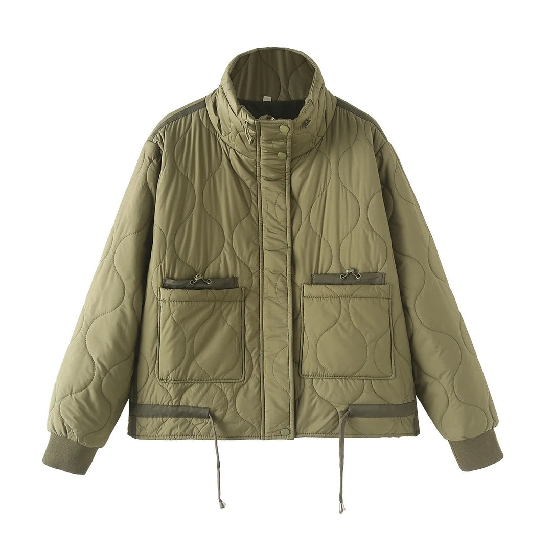Women’s quilted short jacket with high stand-up collar, large flap pockets, and drawstring hem Mune Fashion