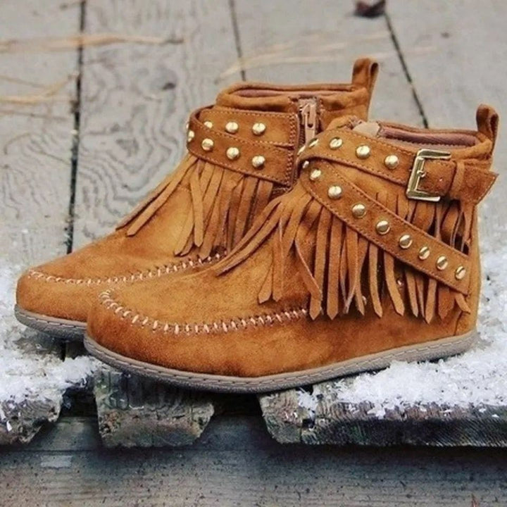 Ladies nan fringe ankle boots with decorative eyelets, side slit zipper and decorative buckle Mune Fashion