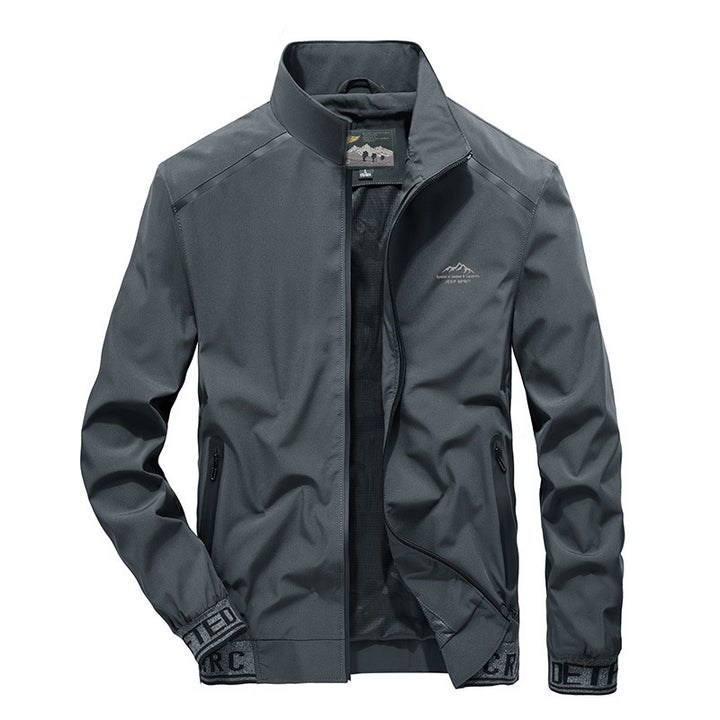 Men's softshell jacket with reflective inserts, water-repellent zip pockets, and high stand-up collar Mune Fashion
