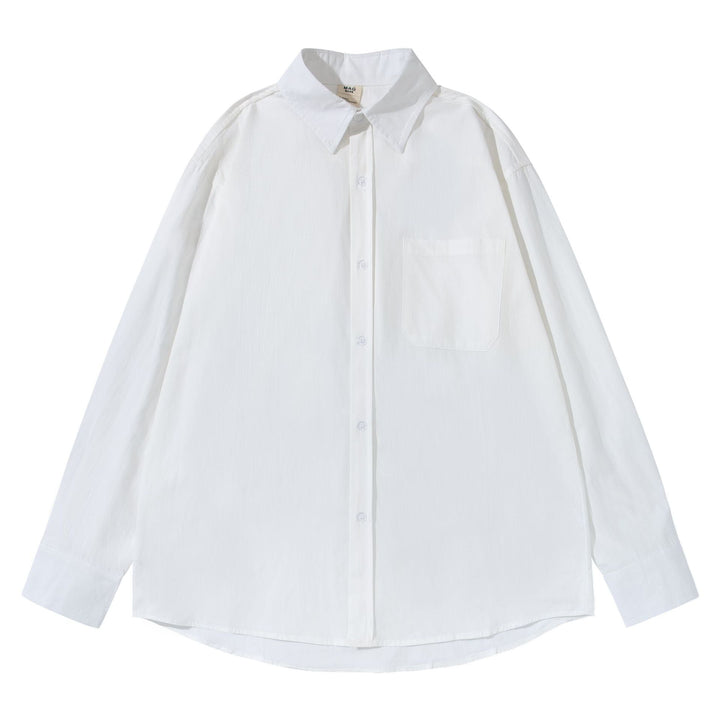 Unisex Boxy shirt with Kent collar, applied breast pocket and relaxed fit Mune Fashion