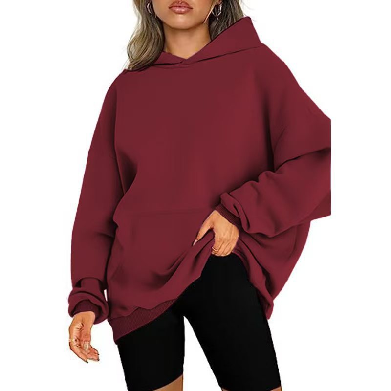 Women’s soft oversized hoodie with asymmetrical hem, kangaroo pocket, and dropped shoulder Mune Fashion