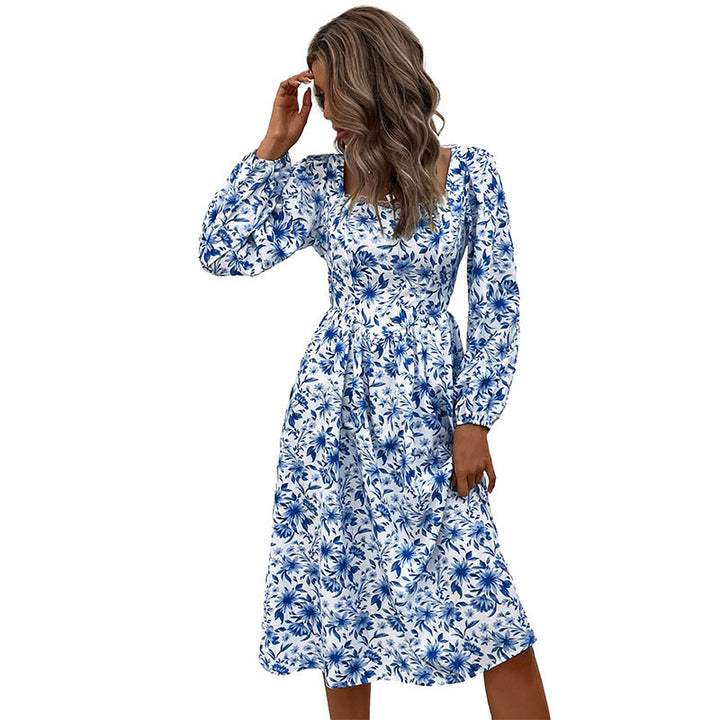 Ladies' midi dress with floral all-over print, heart-shaped neckline and fitted gathering at the waist
