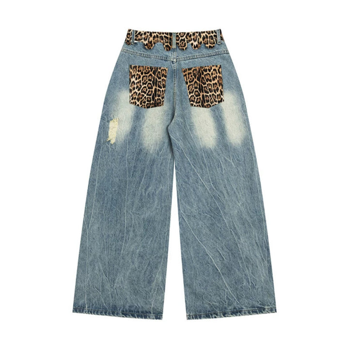 Ladies wide Palazzo jeans with destroyed details, leopard waistband and gothic embroidery Mune Fashion