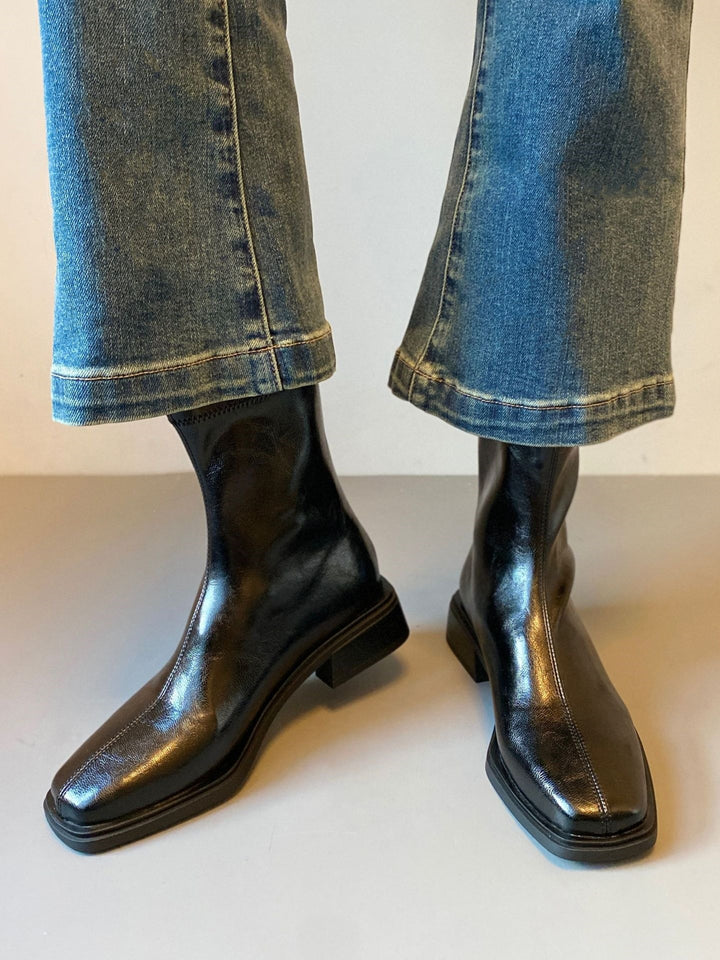 Women ankle boots in riding boot look made of soft smooth leather with square toe seam and stacked block heel Mune Fashion