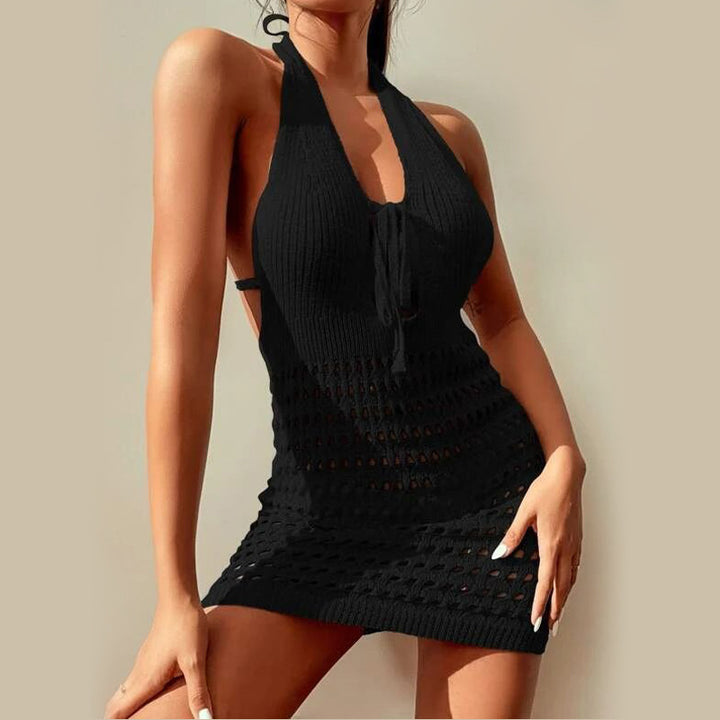 Women's crocheted beach dress with deep V-neck and intricate cut-out details Mune Fashion